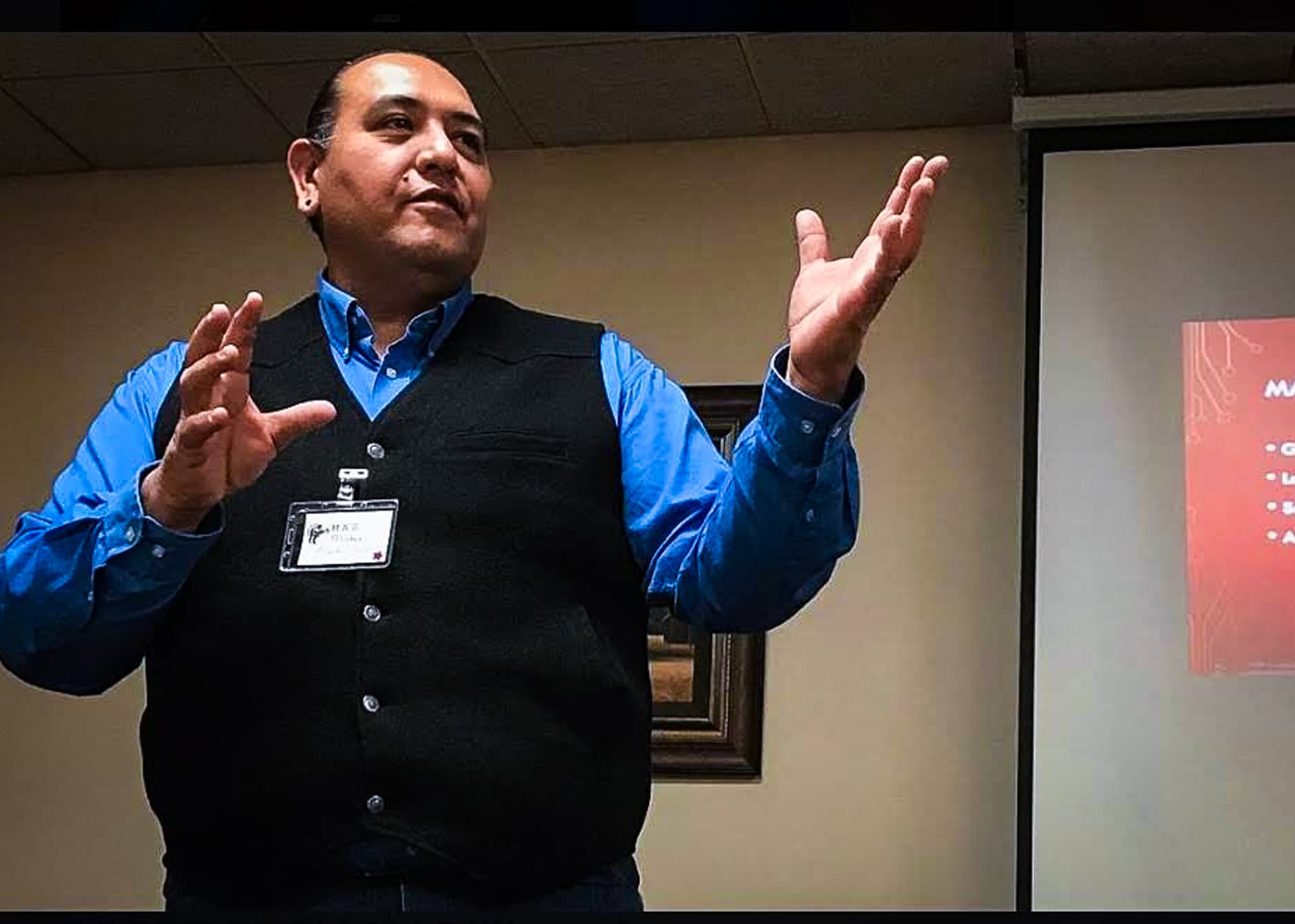Michael Black Wolf speaking with community