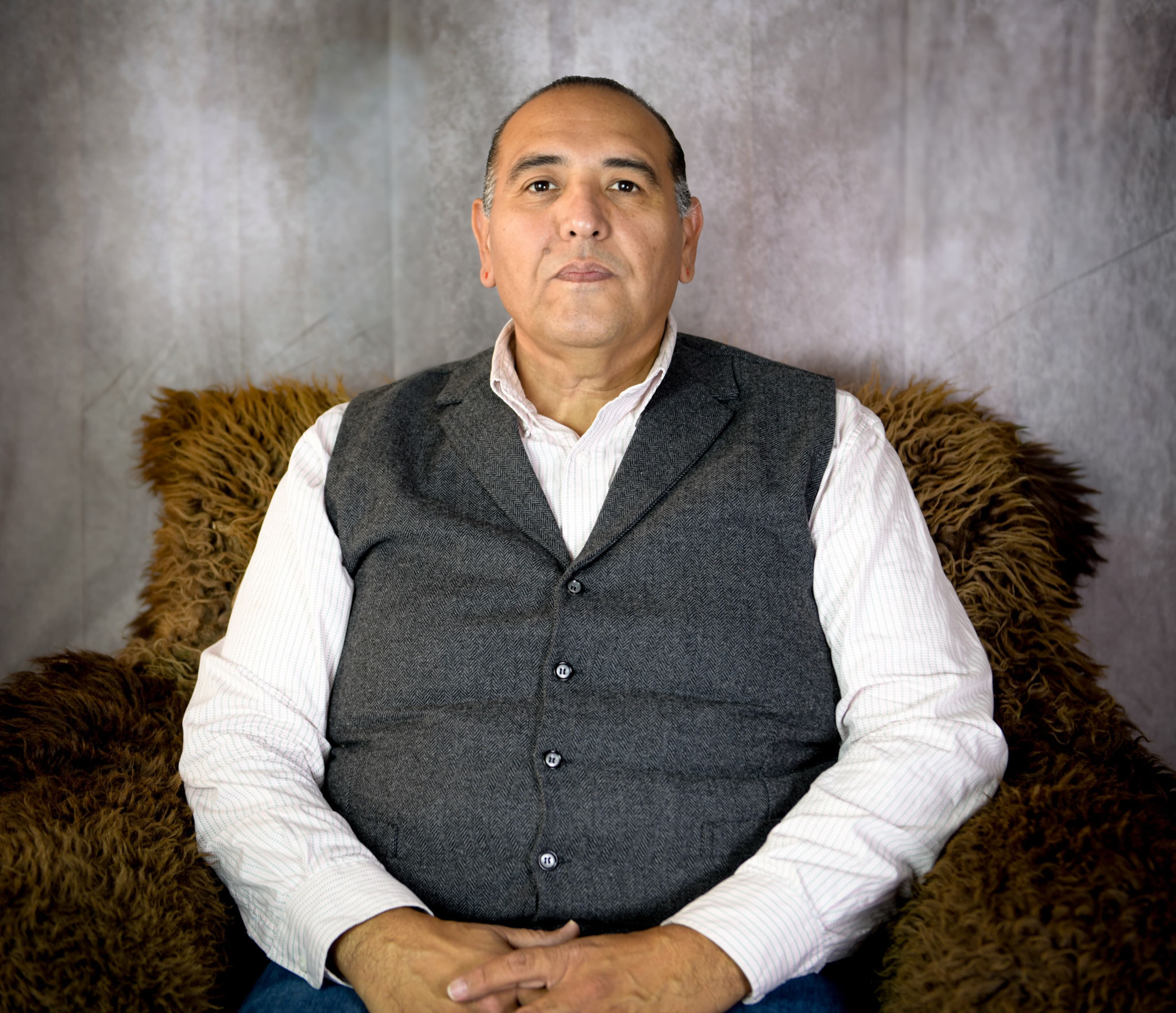 Michael Black Wolf speaking with community